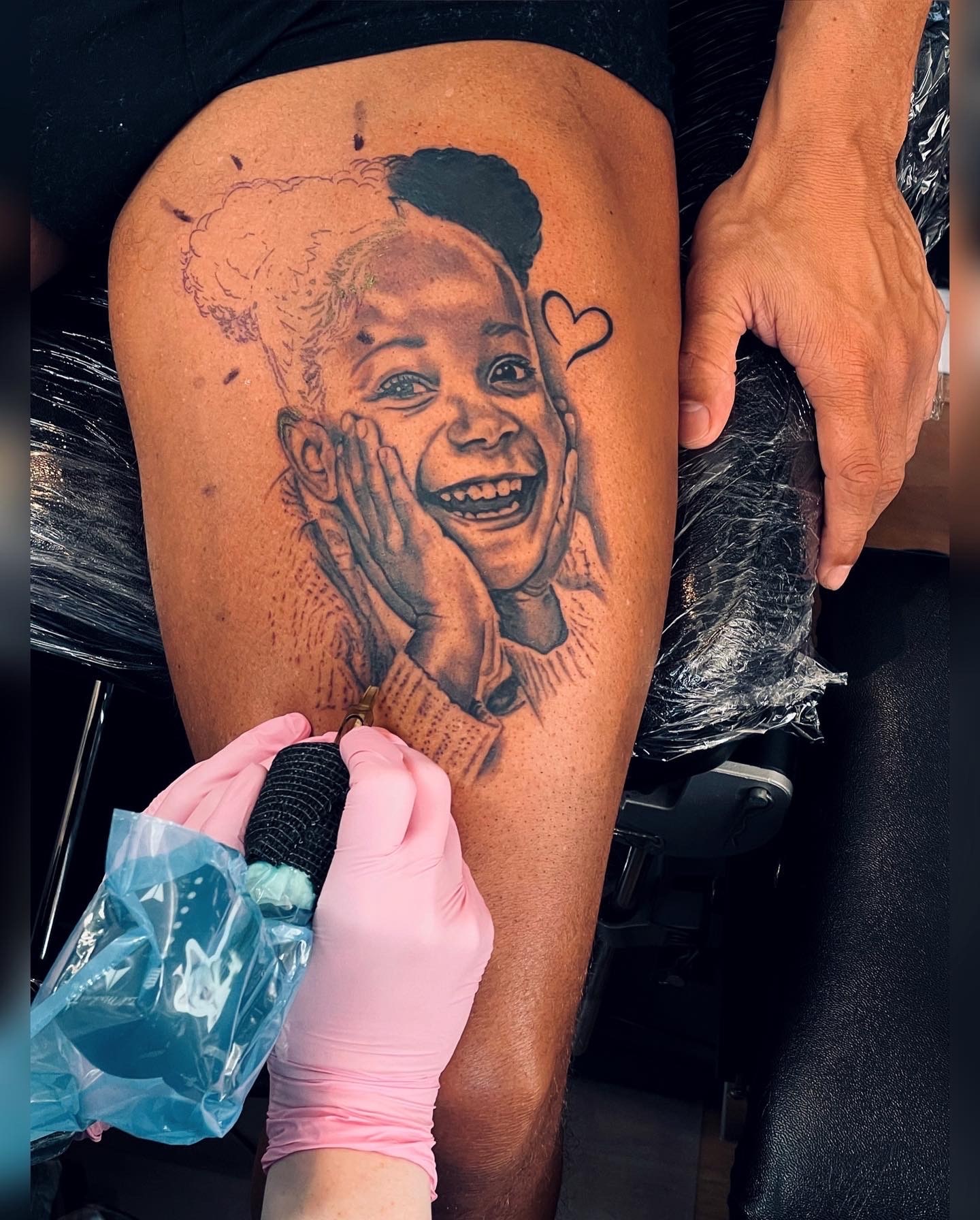 Black and grey portrait tattoo