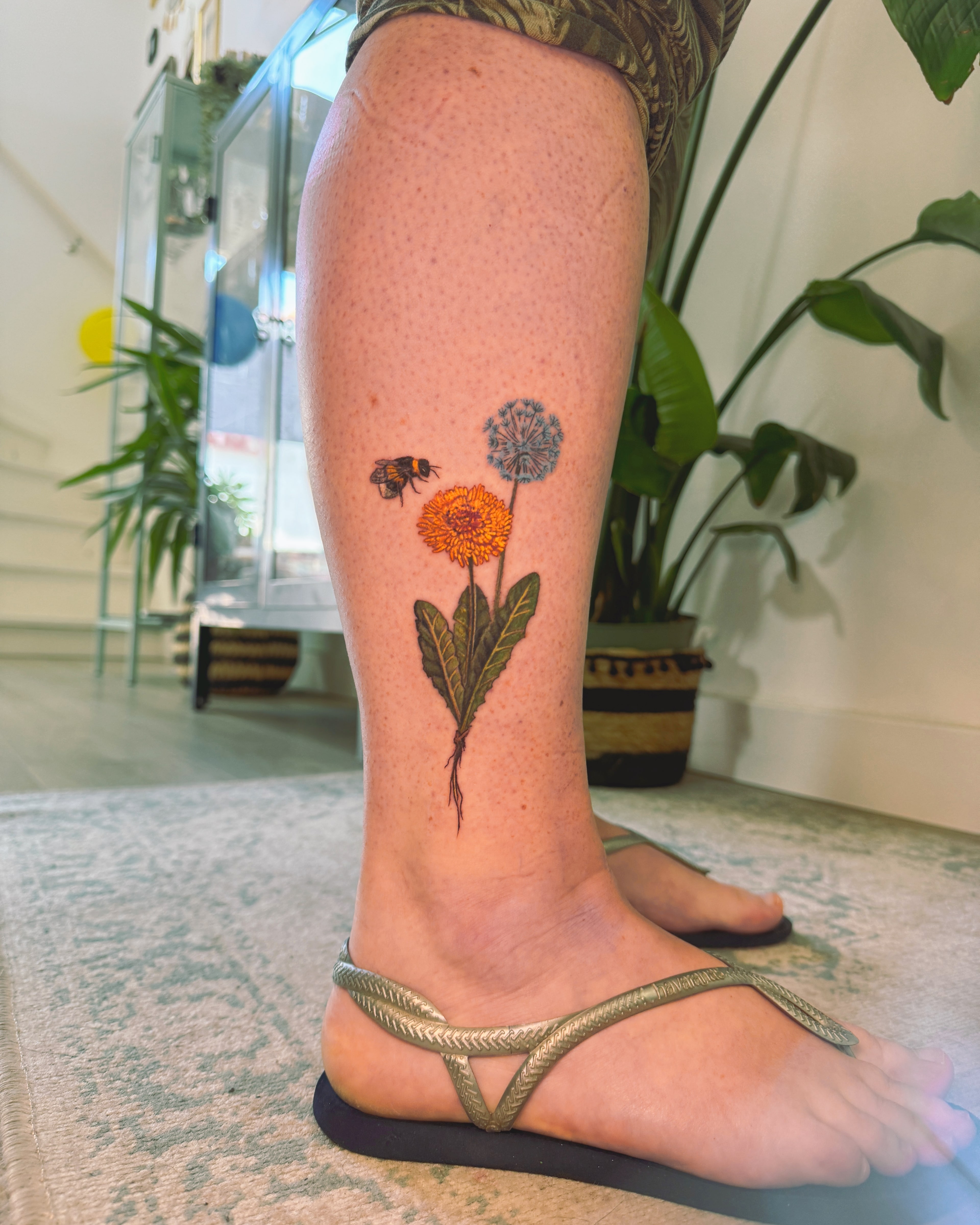 Botanical dandelion flower tattoo
