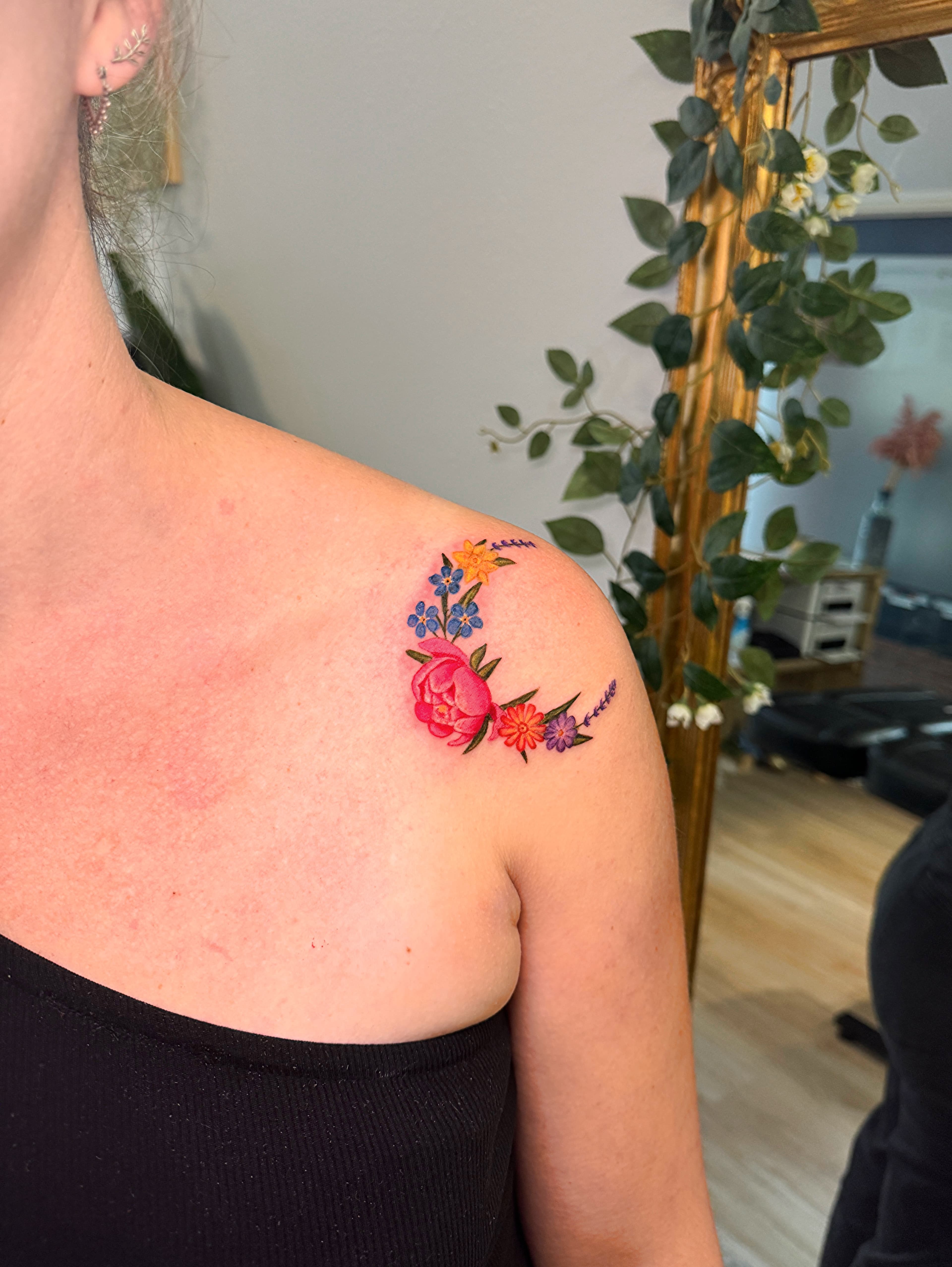 Colourful botanical tattoo by Lydia Szubert